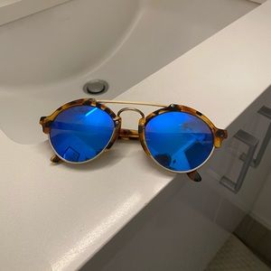 Illesteva Milan 2 sunglasses with tortoise frame and blue lens